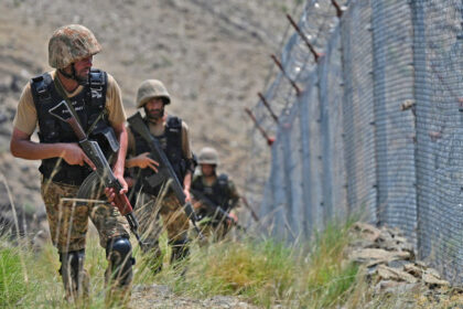 Pakistani soldiers patrolling the border near Afghanistan after ceasefire violation