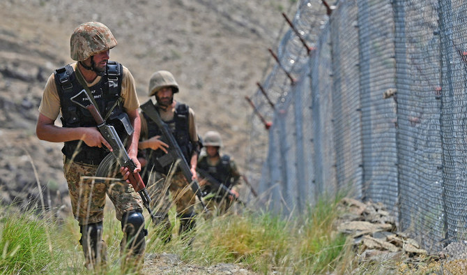 Pakistani soldiers patrolling the border near Afghanistan after ceasefire violation