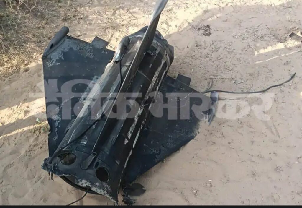 Scene from Rajasthan’s Jaisalmer showing Indian Air Force personnel inspecting debris after a misfired missile exploded near Bhadiariya village during a military exercise on November 9, 2025.