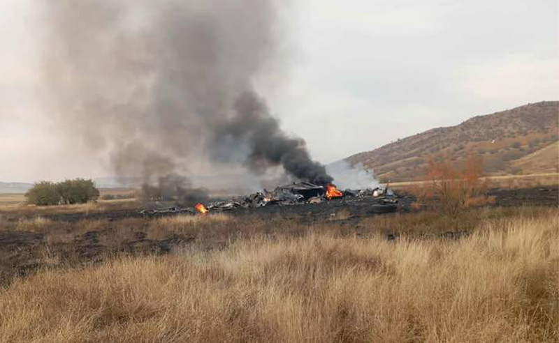 Turkish C-130 military cargo plane crash site near Georgia-Azerbaijan border as rescue teams begin search operations.