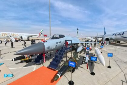 “Pakistan JF-17 Thunder Block III fighter jet displayed at Dubai Airshow 2025 with full weapons loadout, attracting visitors, while Tejas faces backlash over oil leak incident.”