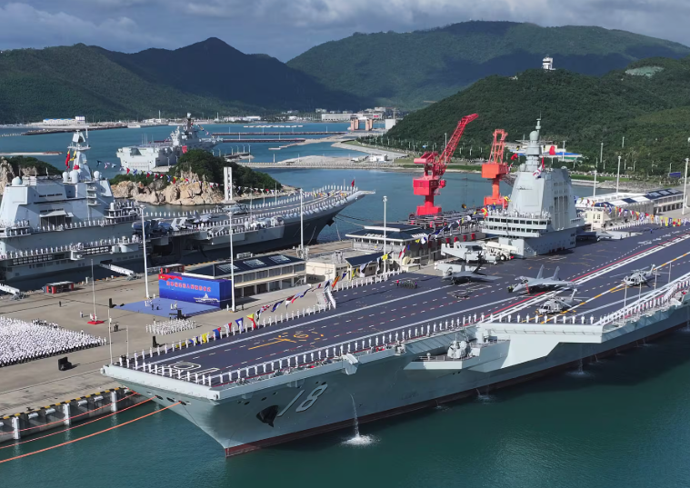 Xi Jinping inspects Fujian aircraft carrier during official induction ceremony.