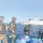 Pakistan Navy sailors search a suspicious drug-laden dhow in the Arabian Sea. Photo: INP