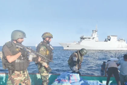 Pakistan Navy sailors search a suspicious drug-laden dhow in the Arabian Sea. Photo: INP