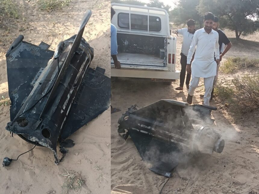 Scene from Rajasthan’s Jaisalmer showing Indian Air Force personnel inspecting debris after a misfired missile exploded near Bhadiariya village during a military exercise on November 9, 2025.