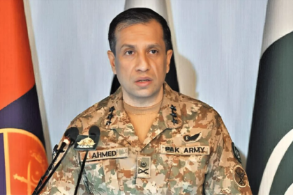 Lieutenant General Ahmed Sharif Chaudhry, Pakistan's military spokesman, delivers a press conference on counter-terrorism statistics for 2025, displaying data about intelligence operations and terrorist incidents across Pakistan.