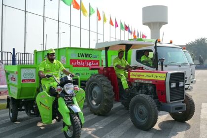 Waste management infrastructure in Punjab, Pakistan showing modern collection vehicles, geo-tagged waste enclosures, and technology-enabled sanitation systems as part of the Suthra Punjab clean cities initiative.